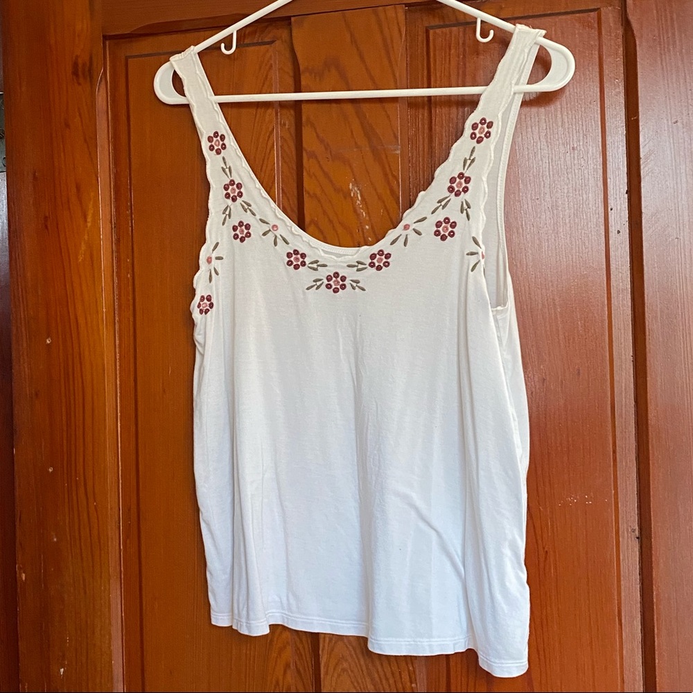 White tank with flowers